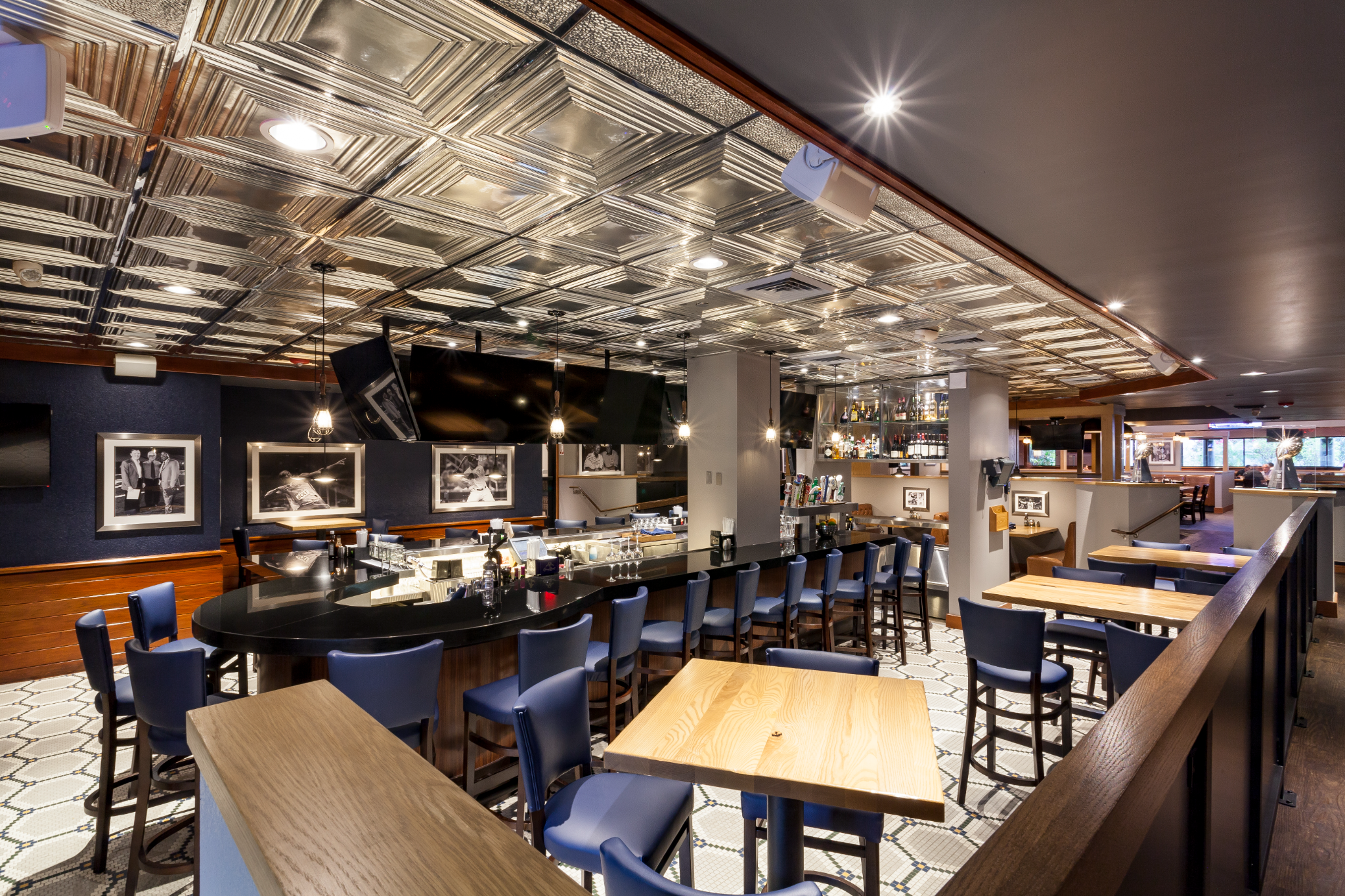 ML Steaks & Sports elegant interior with decorative ceiling and bar area
